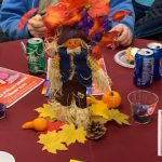 scarecrow decoration on table